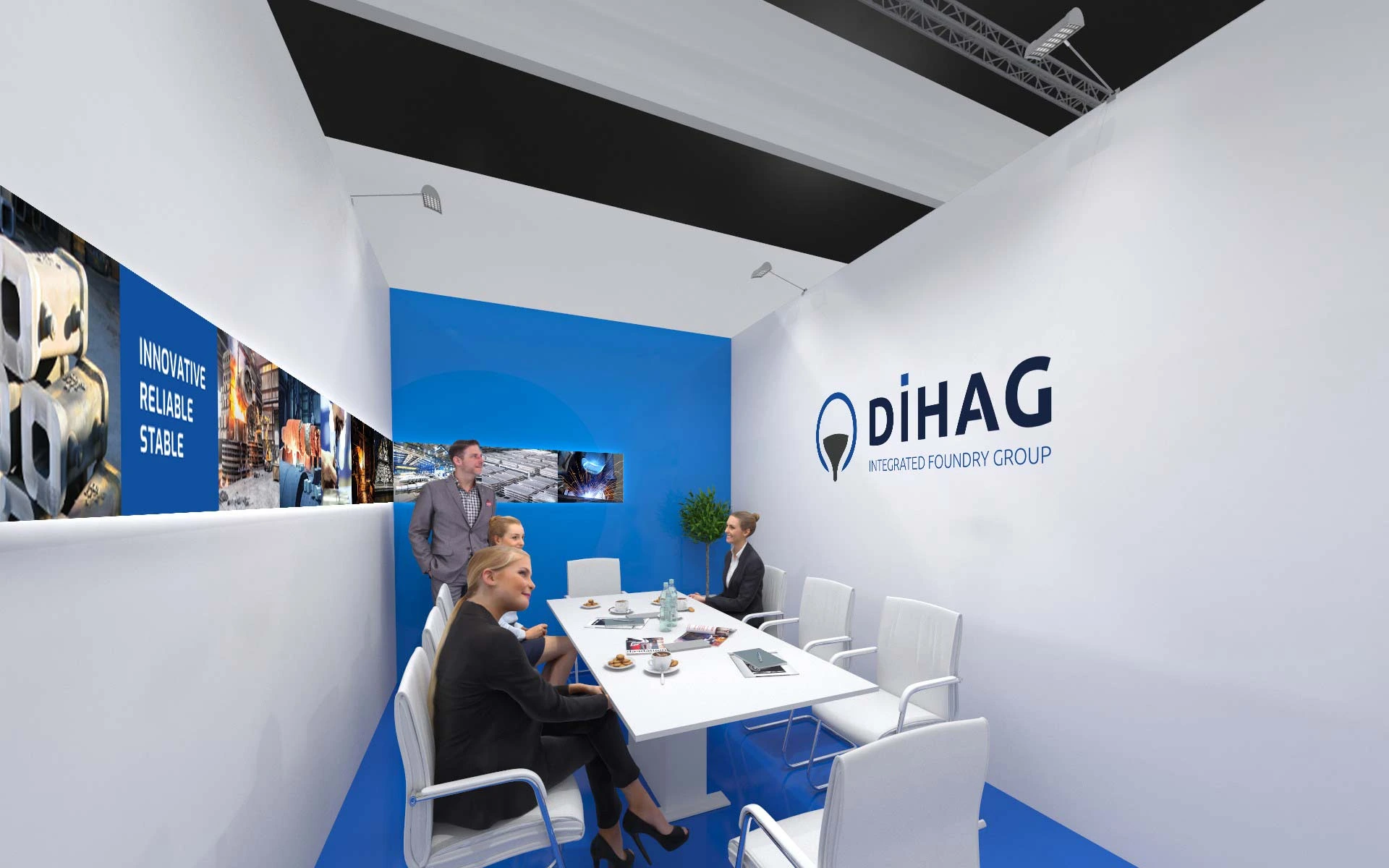 Konferenzraum des DIHAG-Messestands mit großem Logo an der Wand, Präsentationsgrafiken und mehreren Personen in Gesprächssituation.
