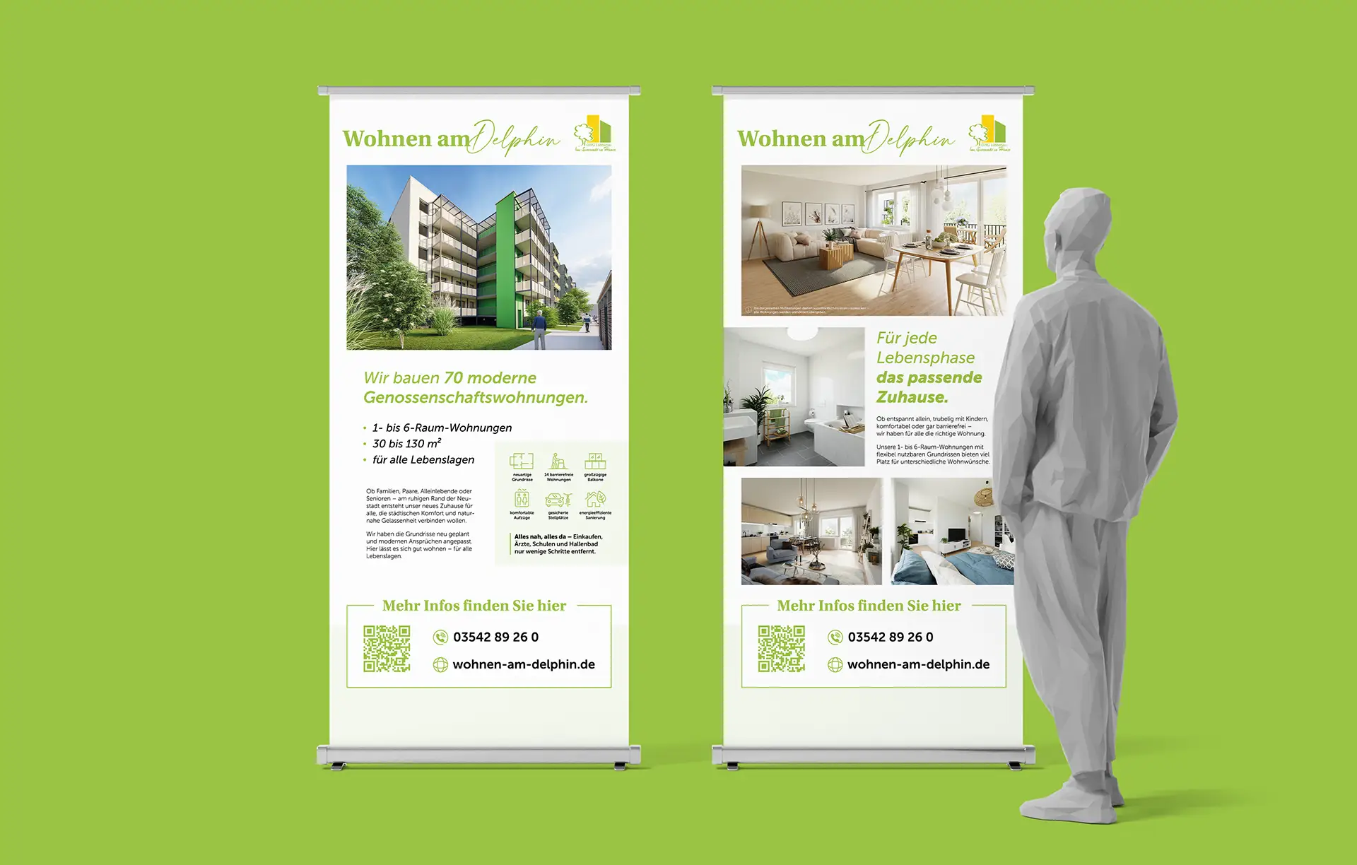 Zwei Roll-ups mit dem Projekt „Wohnen am Delphin“ zeigen Visualisierungen moderner Wohnhäuser und Informationen zur Genossenschaft.
