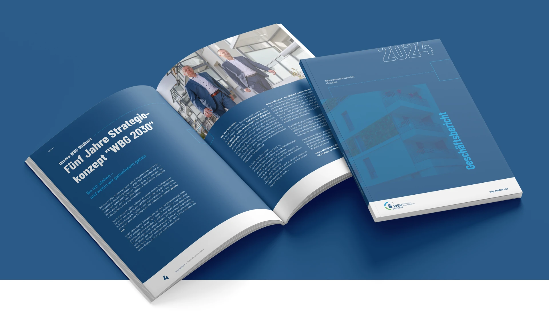 Aufgeschlagener Geschäftsbericht der WBG Südharz mit blauem Titel „Fünf Jahre Strategiekonzept WBG 2030“.
